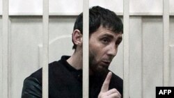 Zaur Dadayev, charged with the murder of Russian opposition figure Boris Nemtsov, speaks inside a defendants' cage at the Basmanny district court in Moscow on March 8.