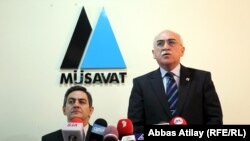 Opposition leaders Ali Kerimli (left) and Isa Qambar called for the annulment of the vote and new elections.