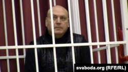 Fashion designer Sasha Varlamau attends the opening court hearing during his trial in Minsk on February 4.