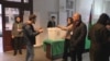 Azerbaijan - election observers facing off with officials at a polling station - screen grab