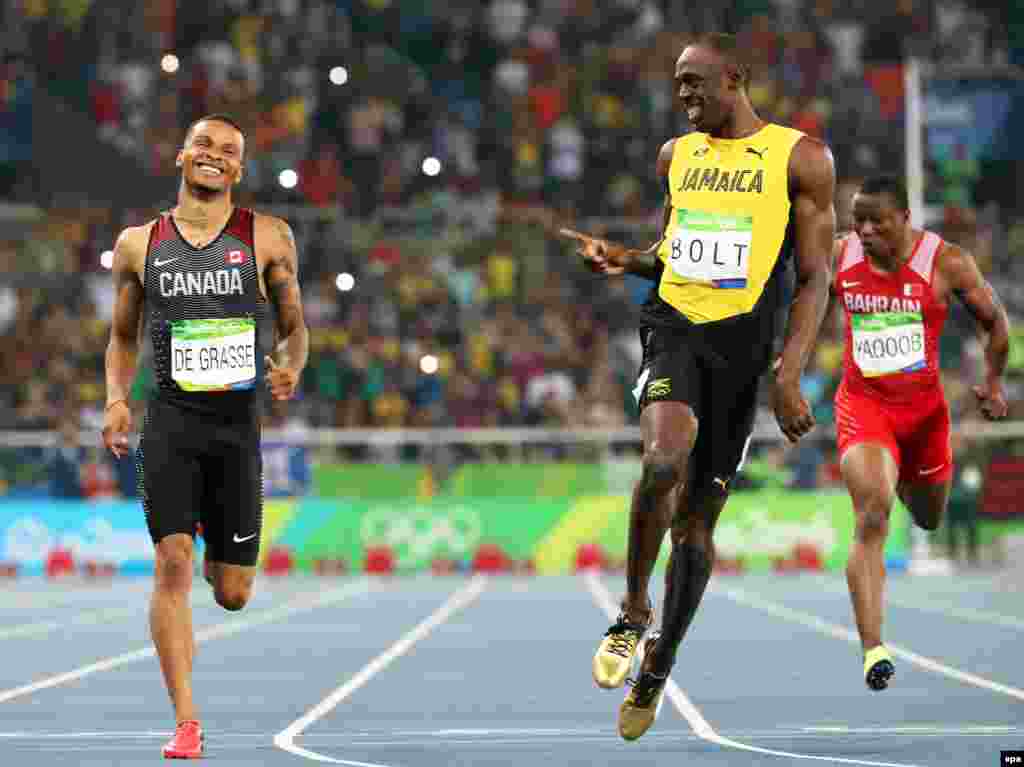 Sprinter Usain Bolt (center) of Jamaica reacts after winning the men's 200-meter semifinals at the Rio Olympics. Bolt declared himself “the greatest” during the games, which saw him haul in three gold medals to bring his Olympic career total to nine.