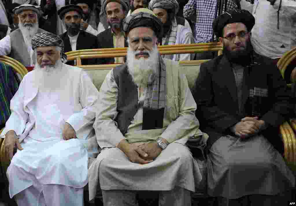 Abdul Rasul Sayyaf (center) Pashtun Vice-presidential running mates: Ismail Khan (ethnic Tajik) (left in photo) and Abdul Wahab Erfan (ethnic Uzbek) (right in photo) Sayyaf (born in 1946) is an influential lawmaker from Kabul who is one of the most controversial and conservative of the candidates. He is an Egyptian-trained cleric who is credited with bringing leading Al-Qaeda figures -- including former leader Osama bin Laden -- to Afghanistan during the Soviet occupation in the 1980s. Sayyaf’s right-hand man, Khan, is the former energy and water minister. Khan, a former Tajik warlord from Herat Province, is referred to as the emir (or king) of western Afghanistan.