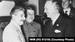 According to Vladimir Putin, Soviet leader Josef Stalin (left, with German Foreign Minister Joachim von Ribbentrop at the pact's signing) had no choice but to agree to divide up Eastern Europe in a secret pact with Nazi leader Adolf Hitler.