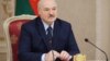 Alyaksandr Lukashenka attends a meeting with governors of Russia's Leningrad and Irkutsk regions in Minsk on September 25.