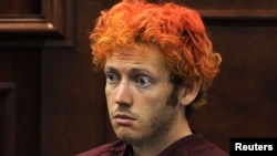 Colorado shooting suspect James Eagan Holmes makes his first court appearance in Aurora, Colorado, on July 23.