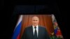 Уладзімір Пуцін на экране ноўбука падчас звароту 26 чэрвеня 2023 году.