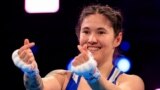 Kazakhstan - Boxer Nazym Kyzaibay, three times world champion