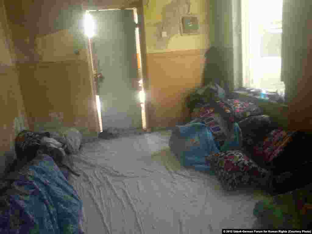 A typical barracks adjacent to the cotton fields where adults and children live during the cotton harvest. Workers sleep on the floors and in many cases do not have access to potable water.