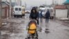 Детская коляска. Но в таких возят не детей, а воду.
