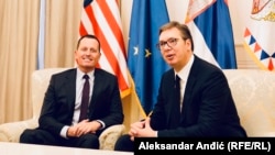 U.S. presidential envoy Richard Grenell (left) with Serbian president Aleksandar Vucic in Belgrade on October 10.