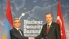U.S. President Barack Obama brought Armenian President Serzh Sarkisian (left) and Turkish Prime Minister Recep Tayyip Erdogan together in Washington, at least for a photograph.