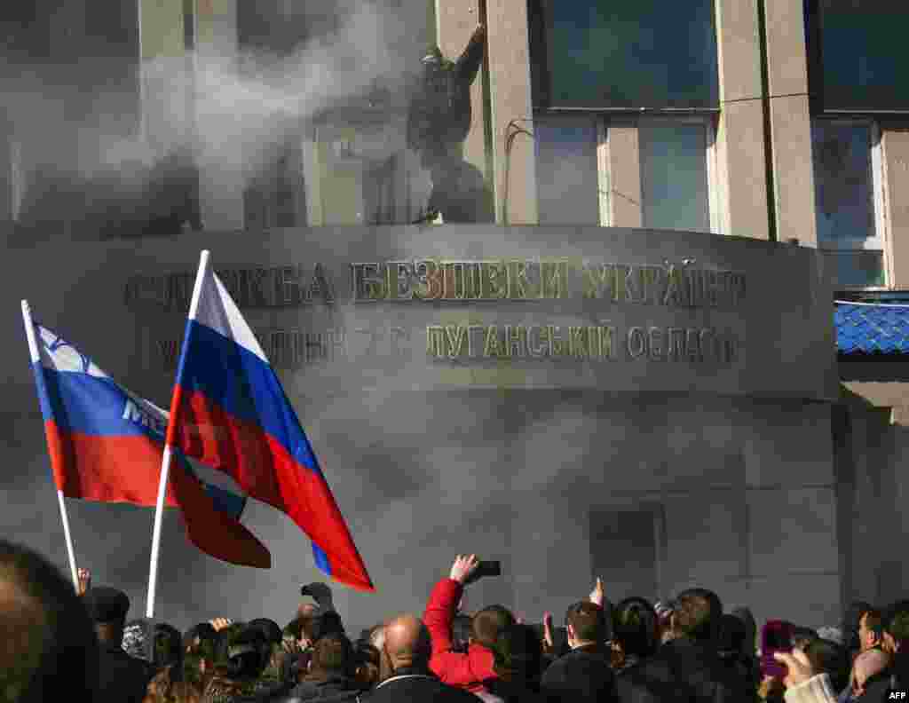 Some pro-Russian activists in Luhansk broke into the headquarters of Ukraine's regional security service, the SBU. 