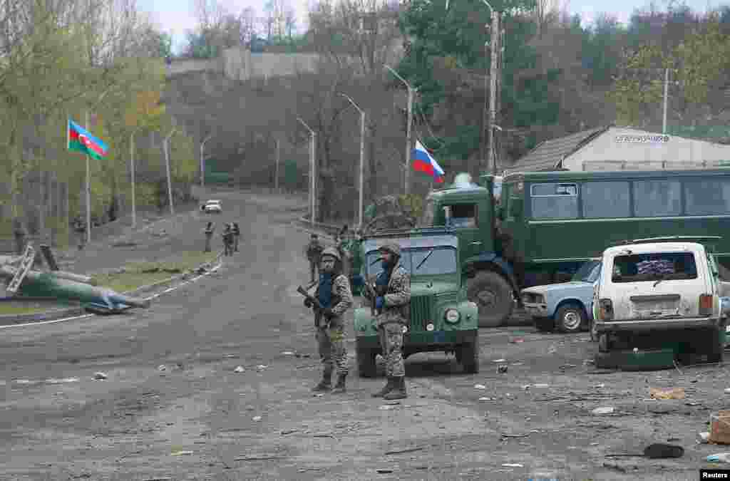 Azerbaijani soldiers guard a checkpoint on the outskirts of Shushi/Susa on November 13. 