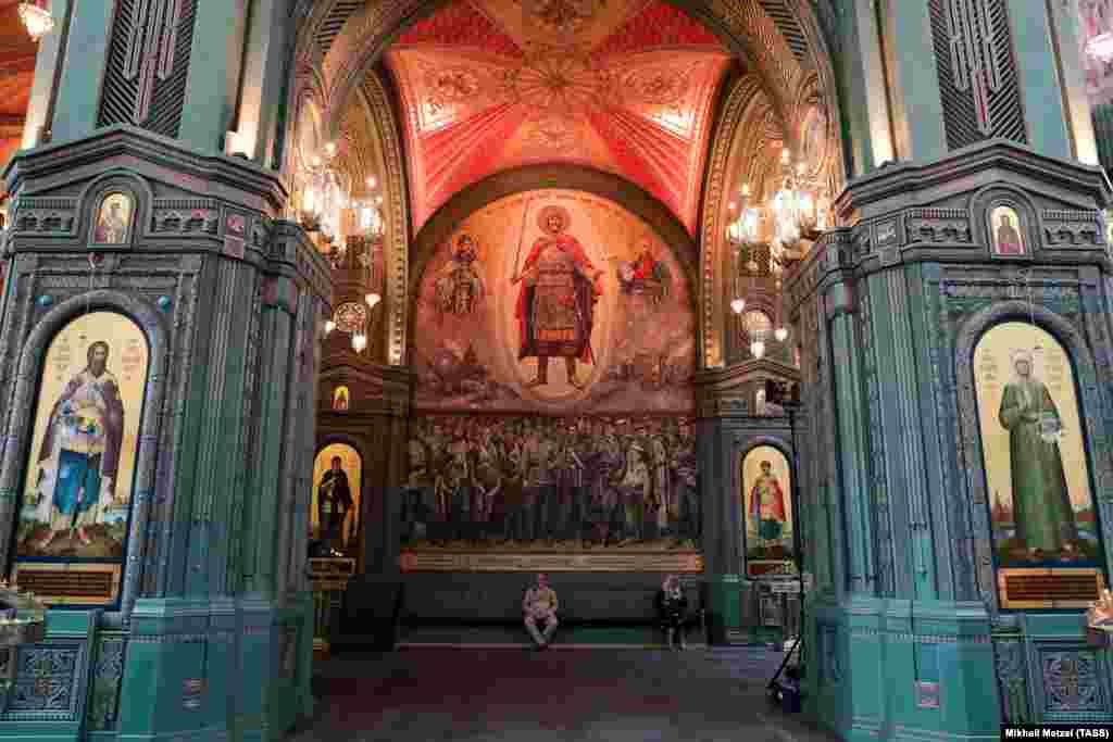 A mosaic on the wall of the cathedral. Earlier this year, leaked photos showed a partially completed mosaic featuring Russian President Vladimir Putin, Defense Minister Sergei Shoigu, and several other Russian officials. The mosaic, along with another depicting soldiers holding a portrait of Stalin, was subsequently removed from the cathedral. 