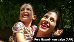 Nazanin Zaghari-Ratcliffe embraces her daughter Gabriella in Damavand following her release from prison for three days on August 23, 2018.