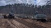 Salvatorii din Lituania să sape într-o turbărie unde a fost descoperit vehiculul soldaților americani dispăruți.