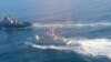 A photo released by Russia's FSB security service apparently showing an encounter between Russian and Ukrainian vessels off the coast of Crimea on November 25. 
