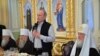 Президент Росії Володимир Путін (із мікрофоном), а праворуч від нього Московський патріарх Кирило, 11 липня 2016 року
