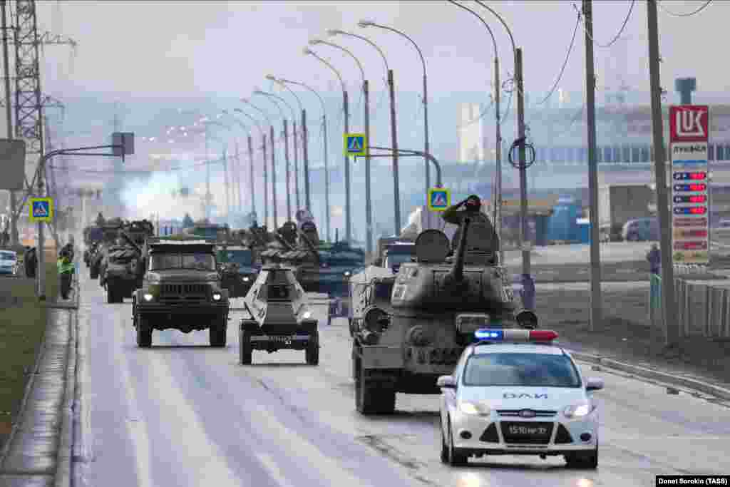 T-34 battle tanks rumble down a Yekaterinburg street during rehearsals for celebrations that will mark the 75th anniversary of the Allied victory in World War II. The event is still set to go ahead on May 9 amid the coronavirus pandemic, but Russian officials have admitted that they may need to reschedule the popular Moscow parade to a later date.