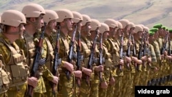 Tajik troops in the volatile Shamsiddin Shohin district bordering Afghanistan (file photo)
