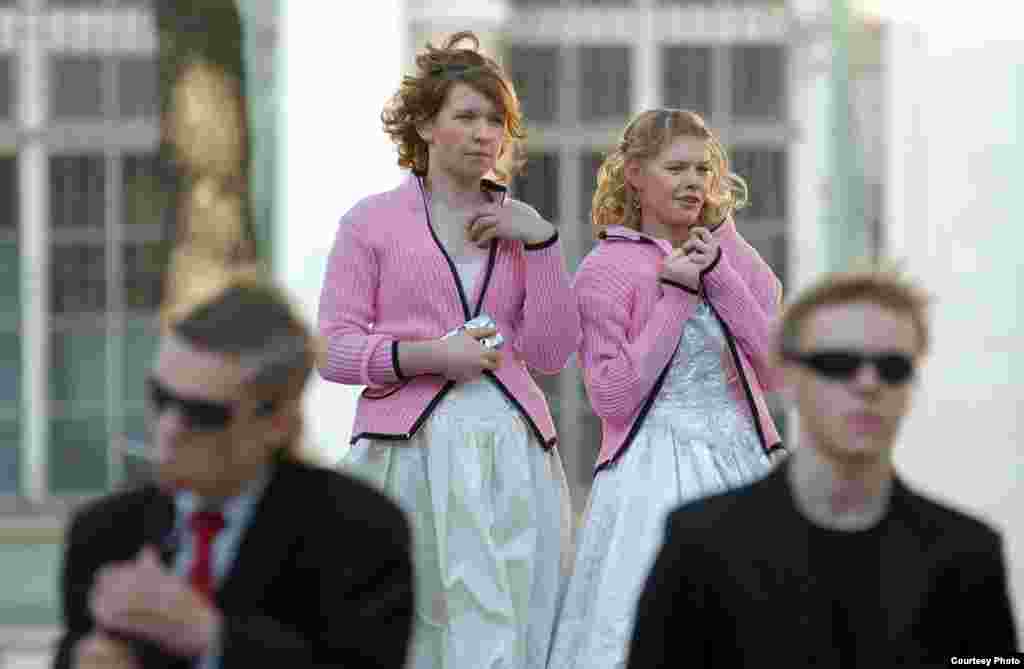 These teenage girls participated in a special ball outside St. Petersburg's Hermitage Museum in 2007. The event brought together girls from local orphanages and cadets from the city's naval academy.
