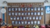 A wall of photos at Taghavard's school showing local fighters killed in the first Nagorno-Karabakh War (1988-94).
