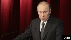 Russian President Vladimir Putin delivers a speech as he attends a meeting with officials from the Interior Ministry in Moscow on March 4.