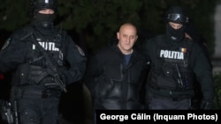 Horatiu Potra (center) was arrested late on December 8 and released on December 10.
