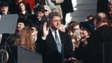 U.S. -- Bill Clinton takes the oath of office alongside his wife Hillary and daughter Chelsea on January 20, 1993. 