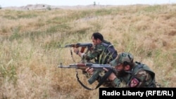 Afghan security forces fighting the Taliban in Kunduz.