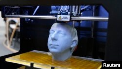 A 3D printer produces a sculpture at the CeBit computer fair in Hannover earlier this year.