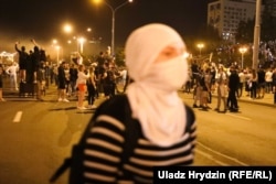 Protestors late on the night of August 9.