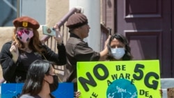 Activists stage a demonstration in Los Angeles against the construction of 4G/5G infrastructure on May 2.