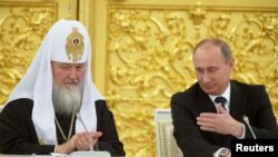 Патриарх Московский и всея Руси Кирилл вместе с президентом России Владимиром Путиным