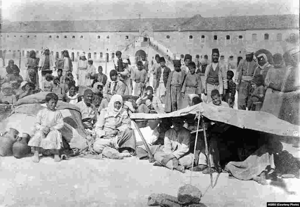 The courtyard of Aleppo's Ottoman barracks, converted into a reception center for Armenians fleeing the mass killings that took place in Armenia during WWI (probably late 1918)