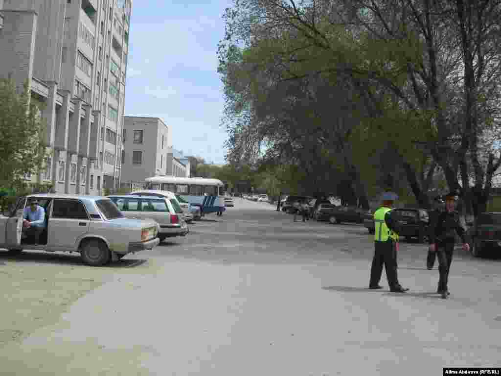 Police guard the streets around the site of a suicide attack in Aqtobe on May 17, which killed only the bomber but appeared to target a national security-forces facility.