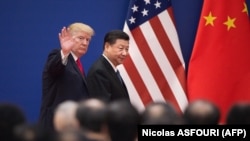 Donald Tramp i Si Đinping, arhivska fotografija