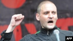 Left Front leader Sergei Udaltsov speaks at an opposition rally in Moscow in June 2012.