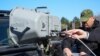 Serbia -- Minister of the Interior Ivica Dacic demonstrates the use of LRAD-450XL and LRAD-100X weapons, Belgrade, March 19, 2025