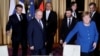 Зліва направо: президент Франції Емманюель Макрон, президент Росії Володимир Путін, президент України Володимир Зеленський та канцлер Німеччини Анґела Меркель, Париж, Франція, 9 грудня 2019 року