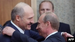 Is Belarusian President Alyaksandr Lukashenka (left) embracing Russia and its billions?