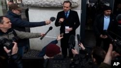 U.S. Ambassador to Hungary David Pressman addresses the media after the parliamentary session ended without a vote in Budapest on February 5.