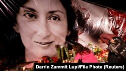 Svijeće i cvijeće za ubijenu novinarku, arhivska fotografija