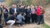 European Commission President Ursula von der Leyen observes destruction following storms during a visit to Jablanica, Bosnia-Herzegovina, on October 23.