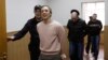 Павел Дмитриченко с подельниками в суде