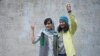 Iranian journalists Niloufar Hamedi (right) and Elaheh Mohammadi, shown after their release on bail on January 14, pending their appeals.