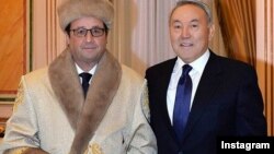 French President Francois Hollande (left) with Kazakh President Nursultan Nazarbaev