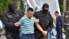 Dozens Detained In Kazakhstan Over Release Of Political Prisoners