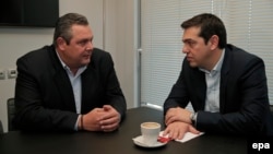 Syriza leader Alexis Tsipras (right) has struck a coalition deal with the Independent Greeks party led by Panos Kammenos (right).