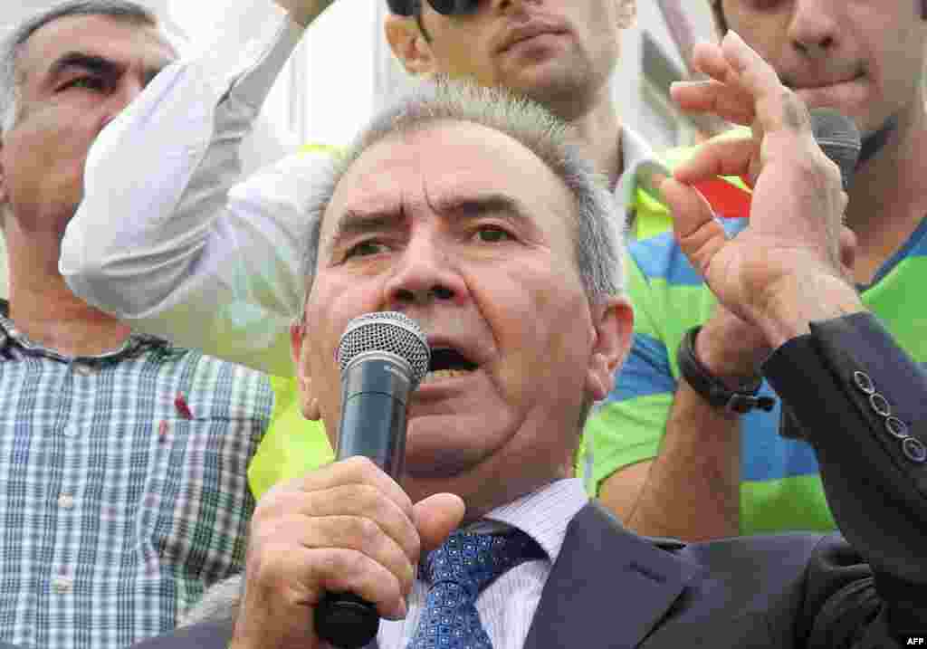 Hasanli, a respected Cold War historian and former lawmaker, has proved a charismatic public speaker, and frequently calls on supporters to vote to "end the dictatorship of one family in Azerbaijan." Here, he speaks at a Baku rally on September 22.